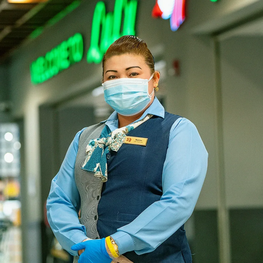 LuLu social post — smiling store colleague in uniform on the shop floor